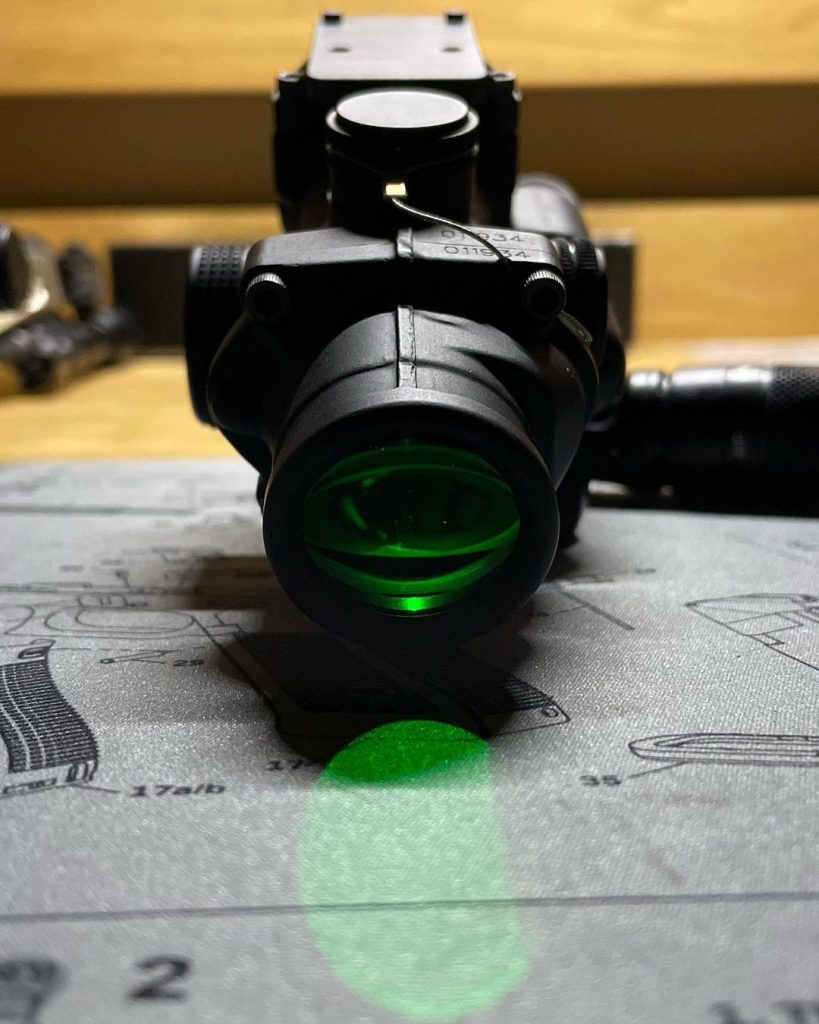 The reticle of an ACOG scope is illuminated by tritium